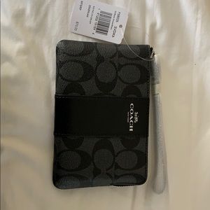 Coach black/black smoke corner zip wristle…